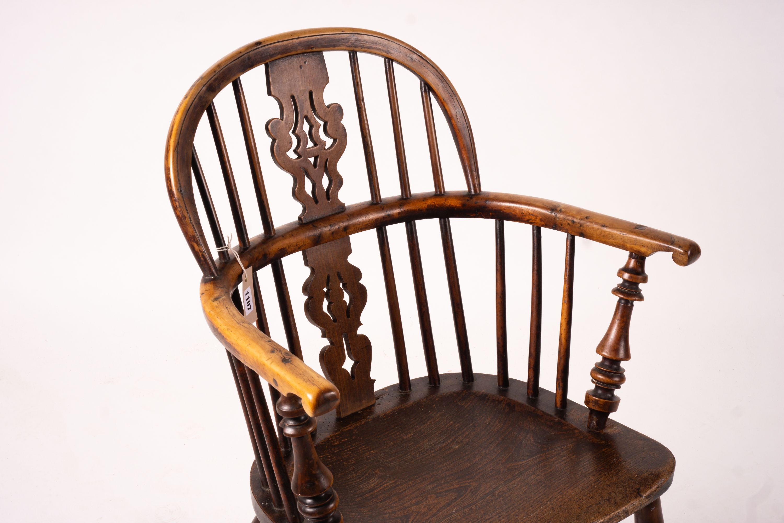 A 19th century yew and elm Yorkshire area Windsor elbow chair with crinoline stretcher, width 60cm, depth 45cm, height 93cm